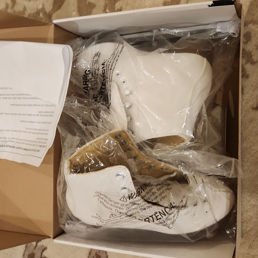 DBX motion figure skates are never worn and brand new.